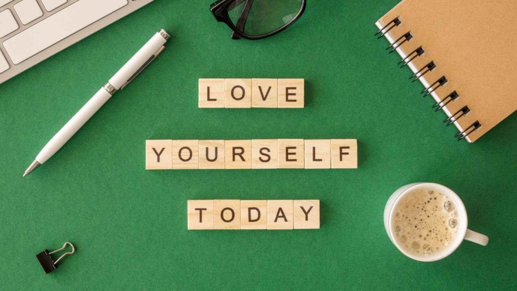 Tiles with love yourself today written on it