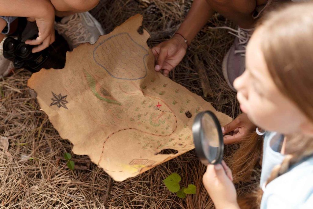 Kids looking at a treasure hunt map