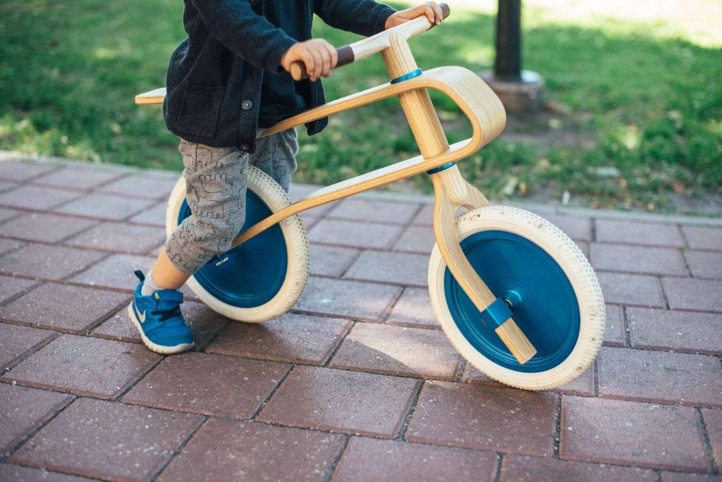 A kid on balance bike