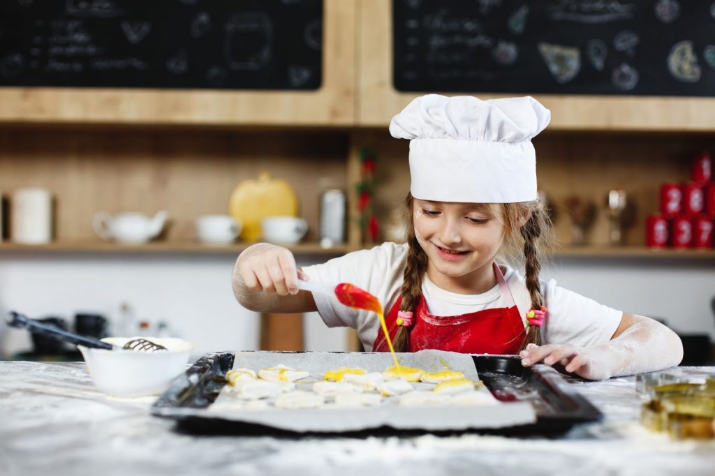 A little girl cooking