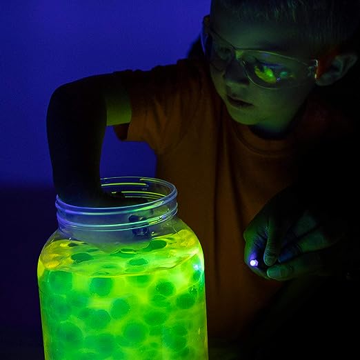 kids hand inside a jar