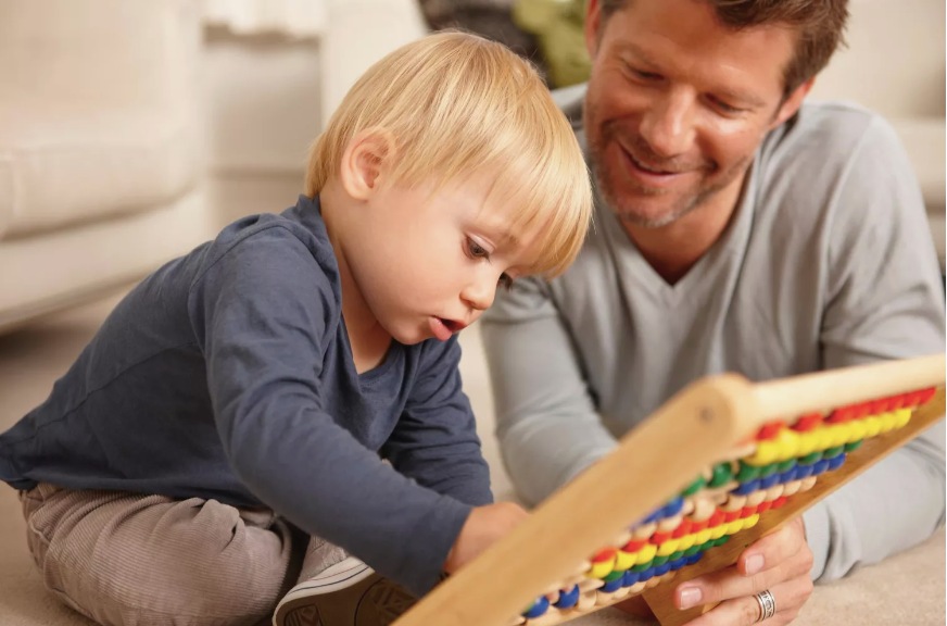 Illustration of a teacher teaching math through abacus