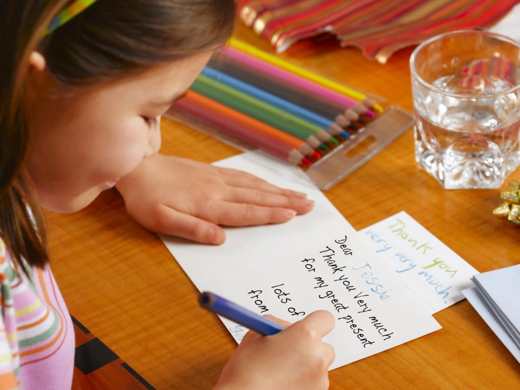 A girl writing a letter