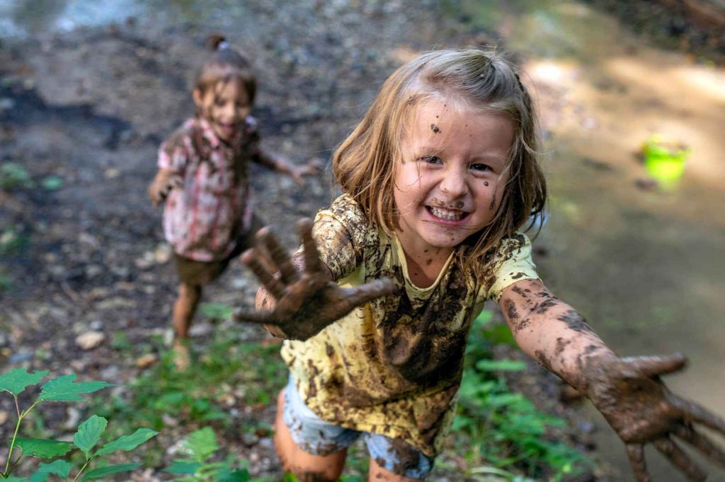 Kids playing in mud