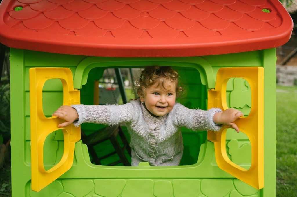 Kid in a playhouse