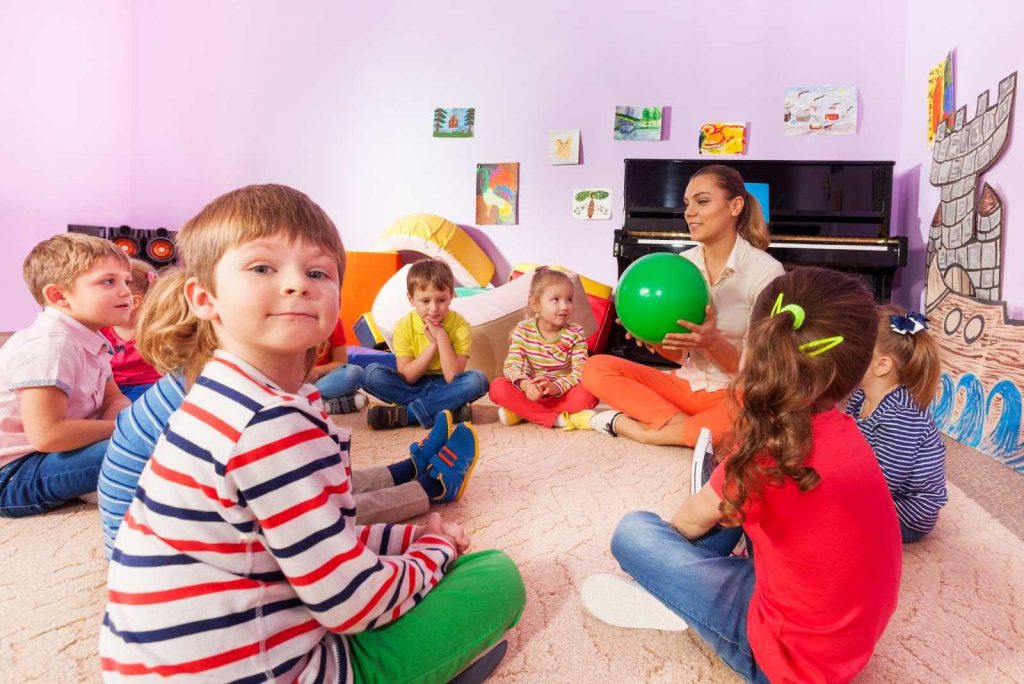 Kids sitting in a circle