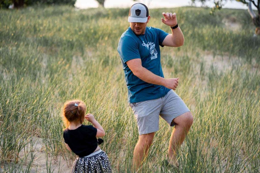 A father and daughter dancing