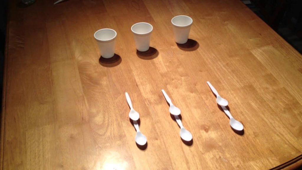 Cups and spoon on the table