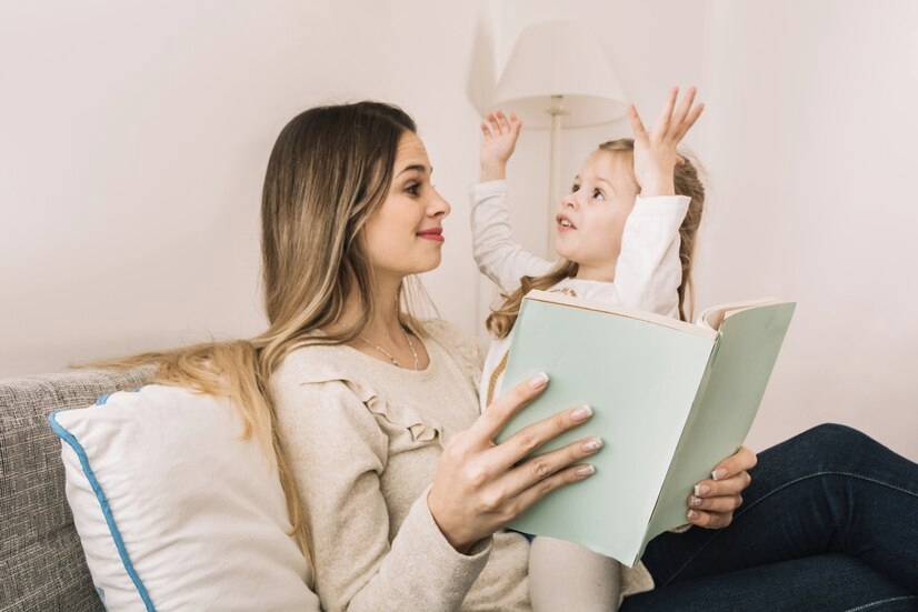 A mother and a daughter reading together