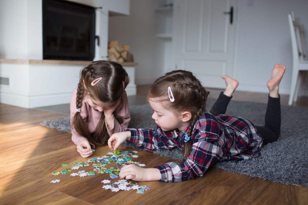 Kids solving a puzzle