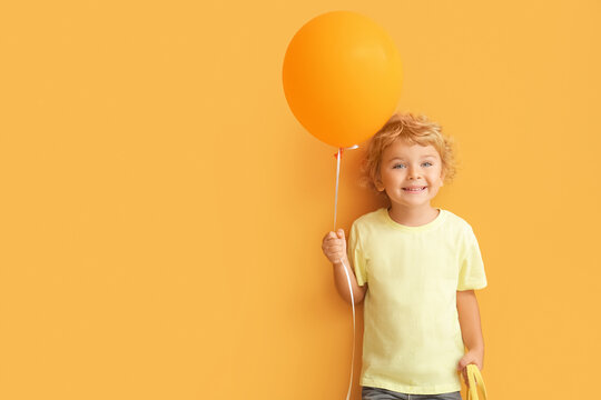 A kid with a balloon
