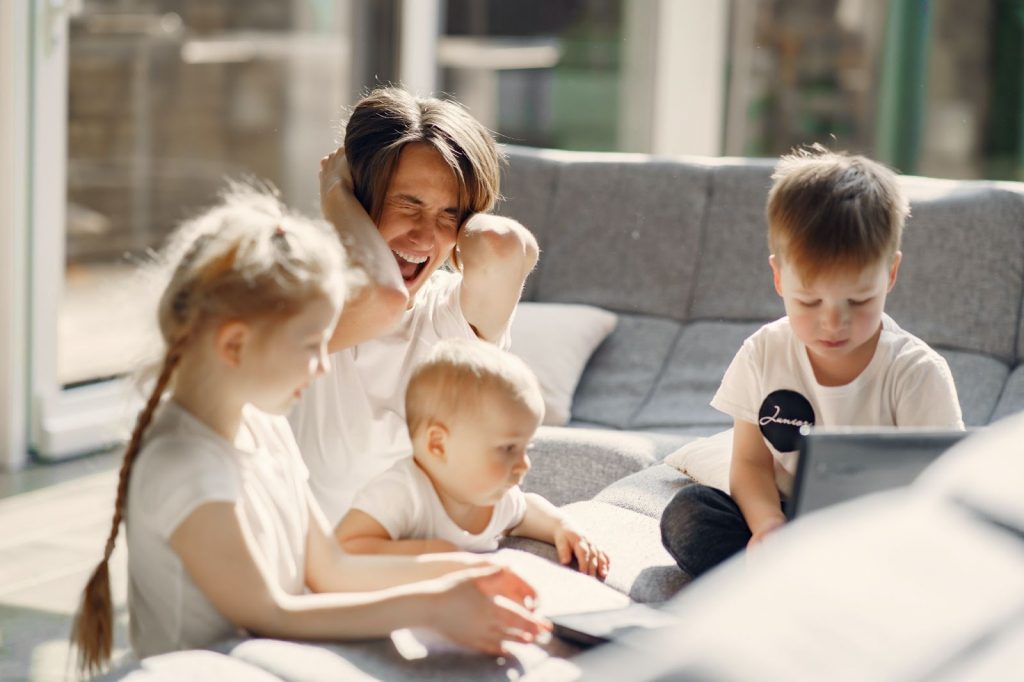 A parent who is stressed with toddlers young kids