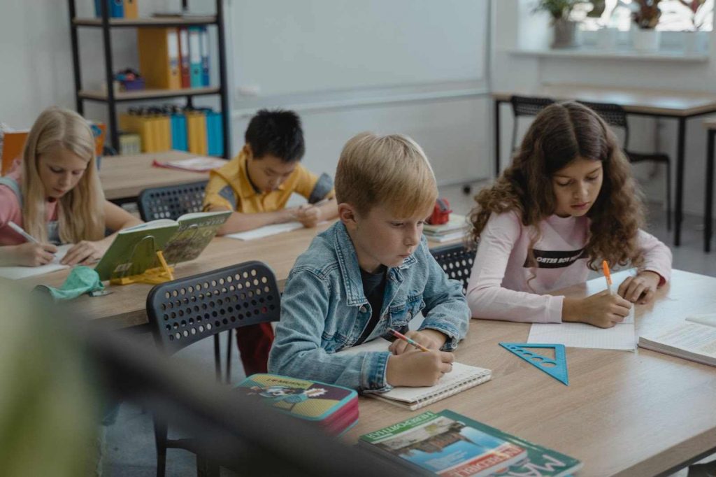 Kids studying in a classroom in public school