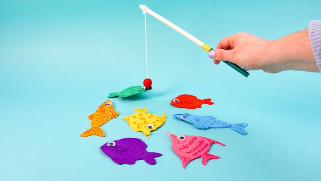 Catching paper fish using a magnetic fish rod