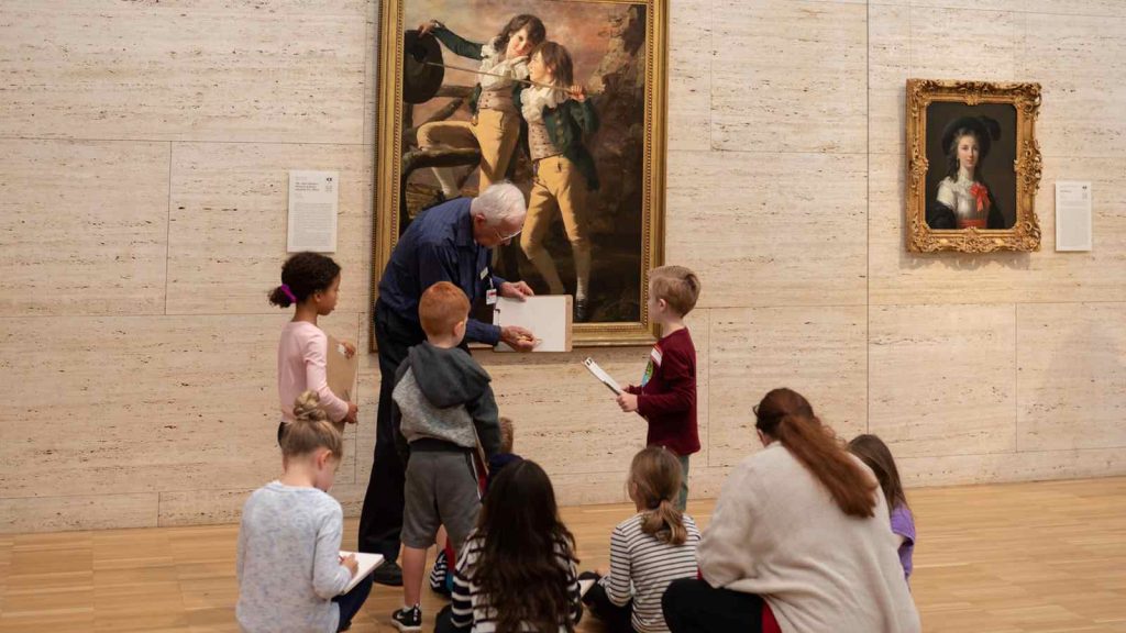 Kids in a museum with a guide