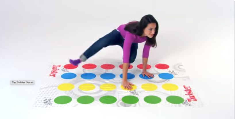 A girl playing twister