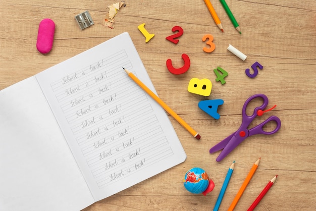 A notebook and other manipulatives on the table