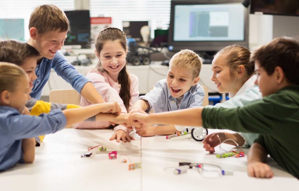 Kids learning together in class