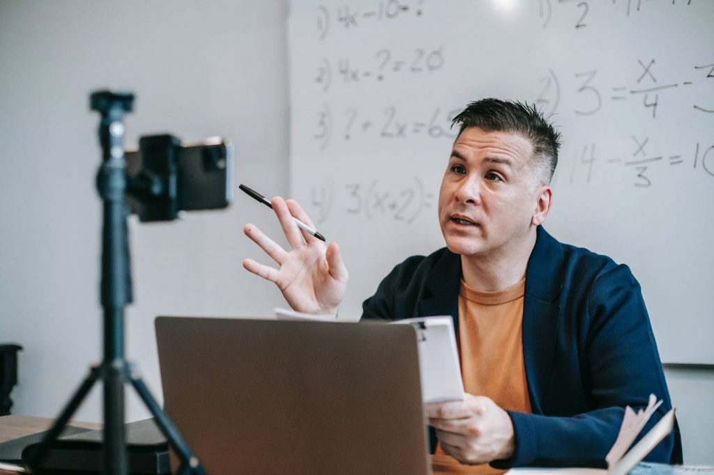 Photo Of Man Talking In Front Of Camera