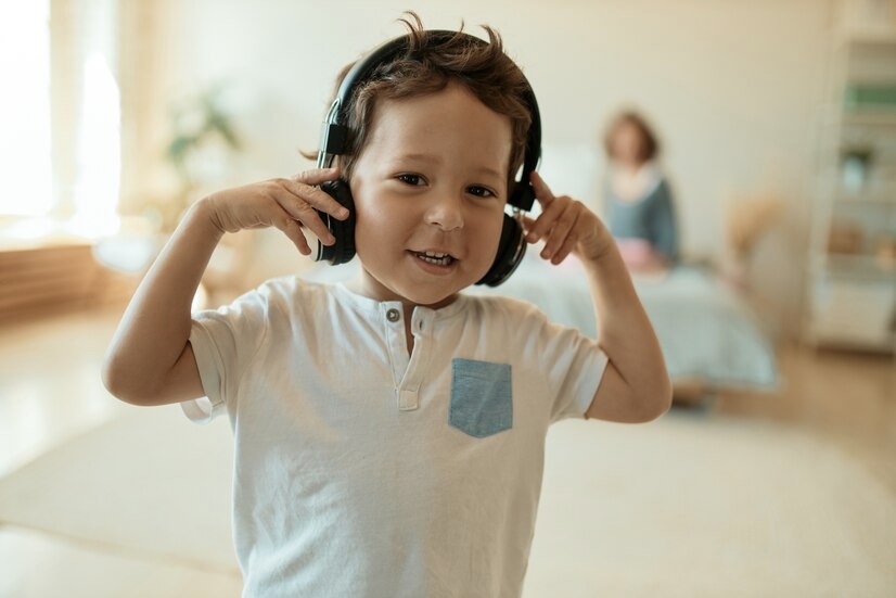 A boy listing to music