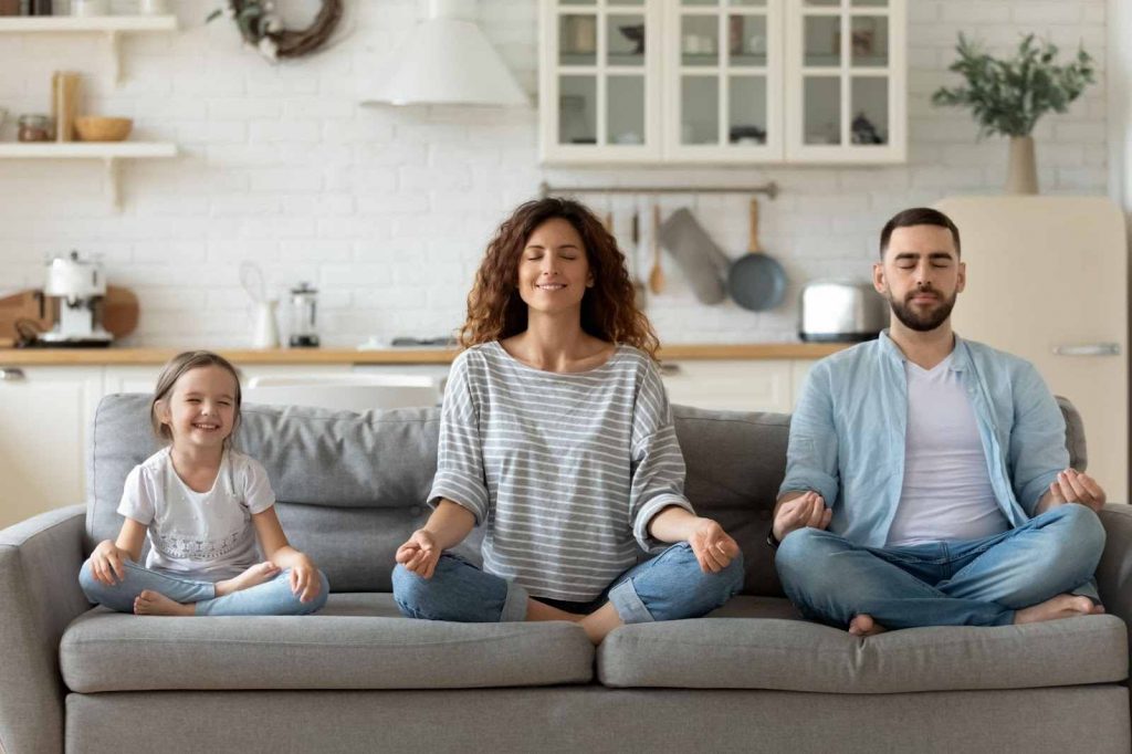 Family meditating together