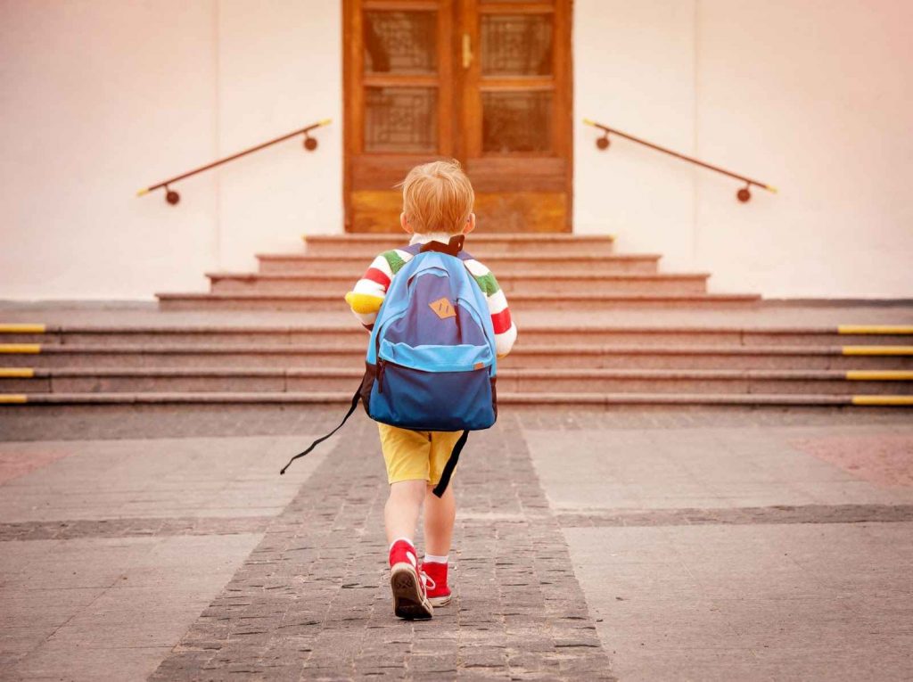 Kid going to school