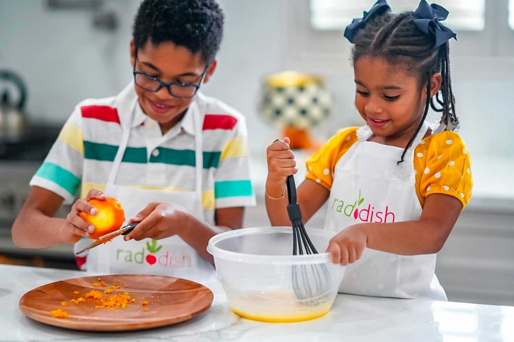 Two kids cooking