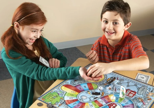 Kids playing Money Bags Coin Value Game