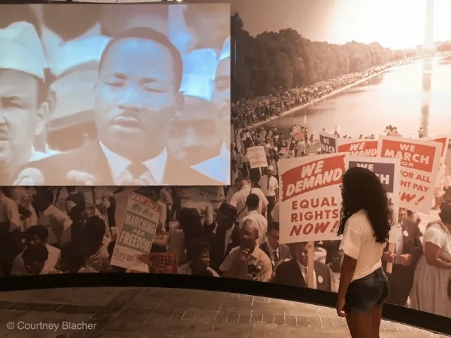 A kid in black history museum