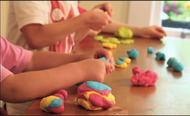 Kids playing with playdough