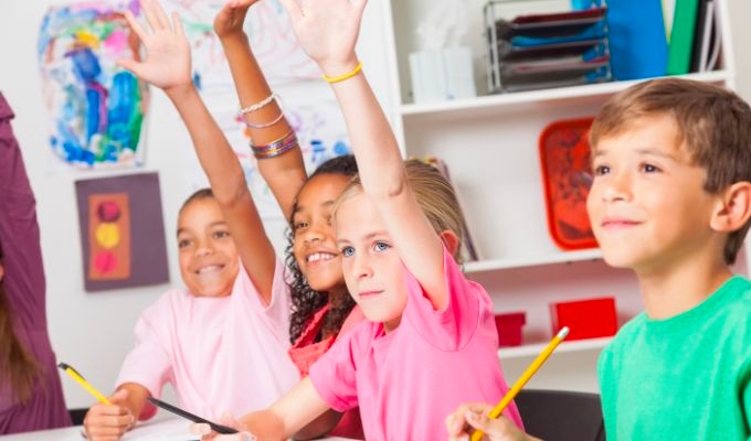 Kids raising their hands