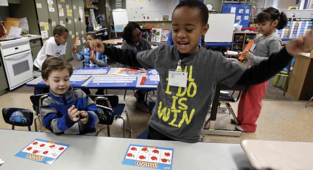 Kids playing bingo in the classroom