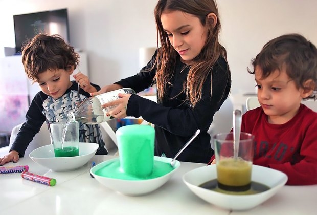 Kids doing a science project together