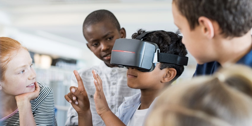 kids using VR in classroom