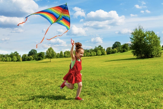 A kid flying a kite