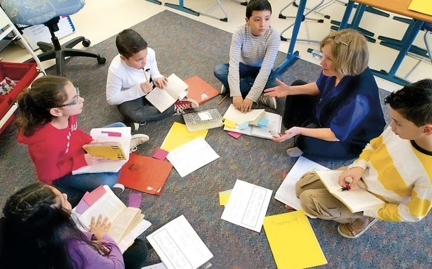 Kids in a writing workshop