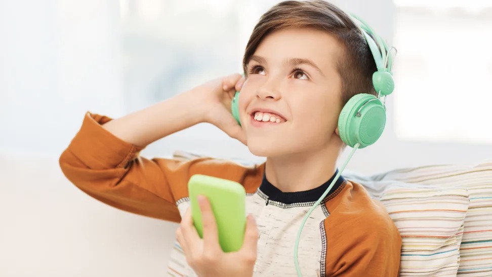 Kid listening to podcast