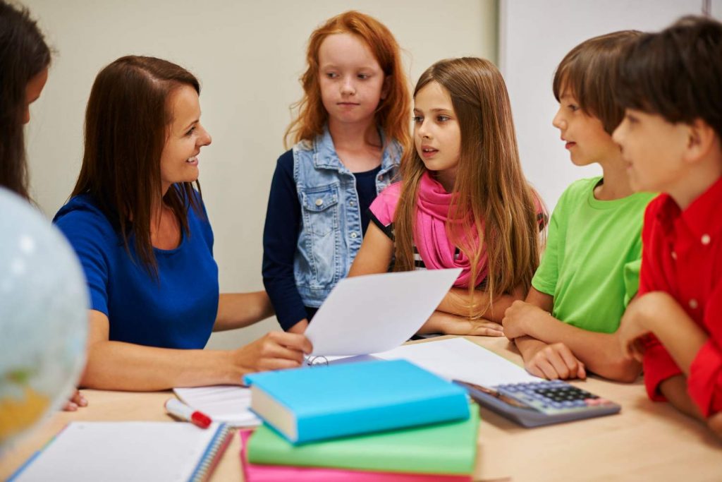 Teacher asking questions to students