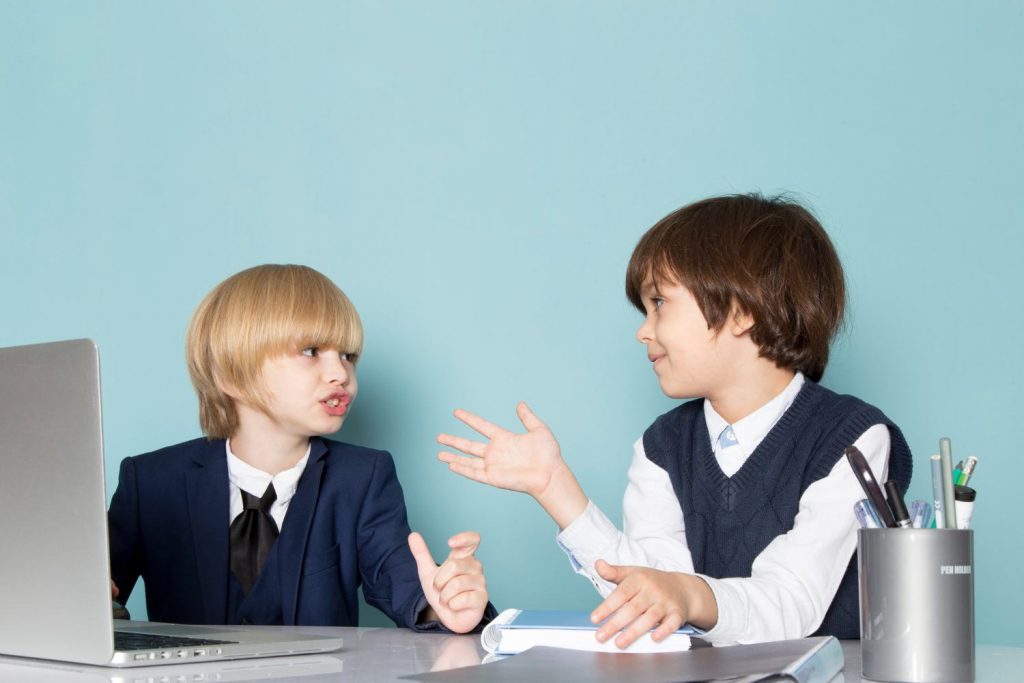 Two students discussing a task