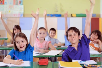 Kids raising their hands