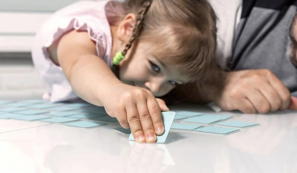 Kid playing memory game