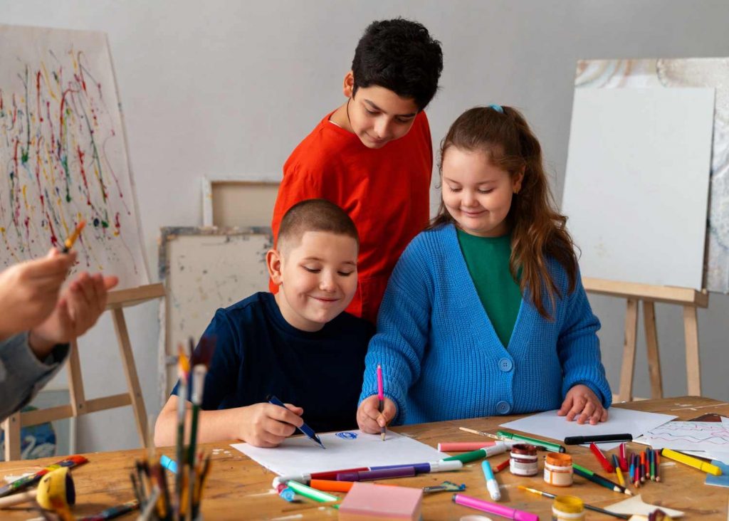 Children taking drawing classes in the school