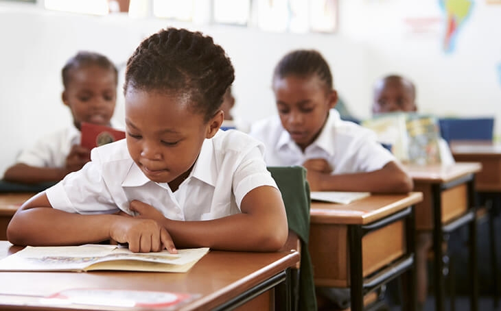 Kids reading books silently