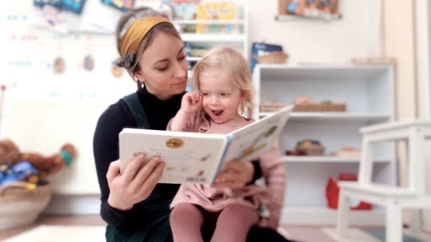 Mother and kid reading a book