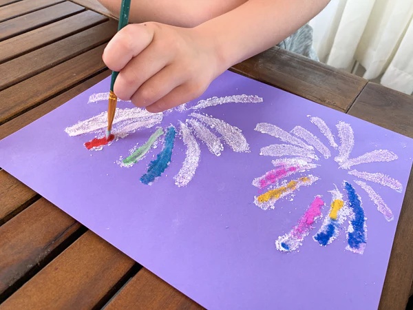 kid painting fireworks