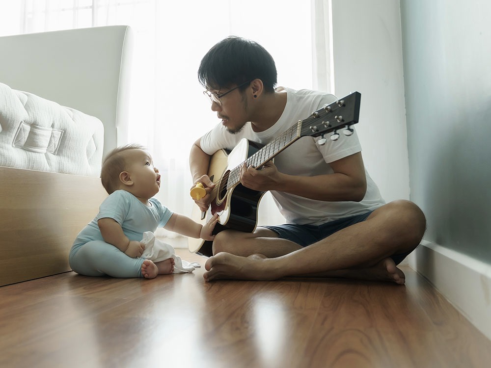 Father singing to child