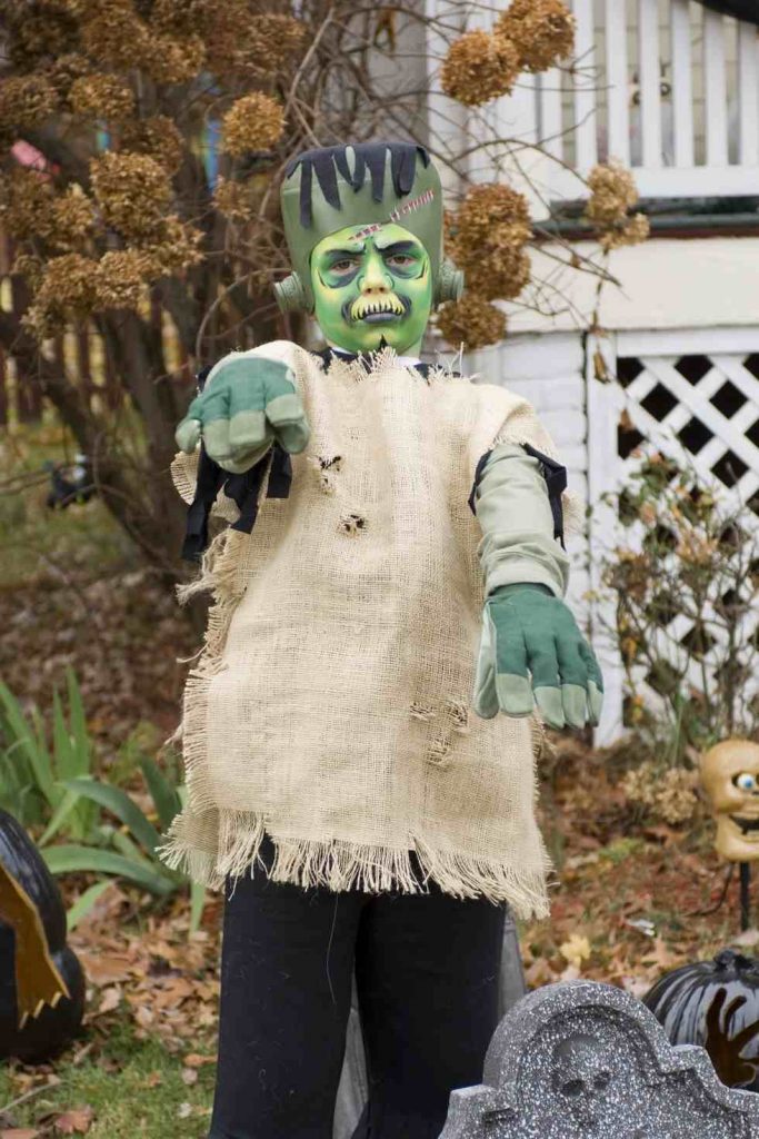 Image of a kid in Frankenstein monster's costume for Halloween