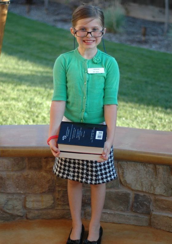 Image of a kid dressed as a librarian for Halloween