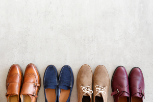 Four pairs of shoes arranged in a row